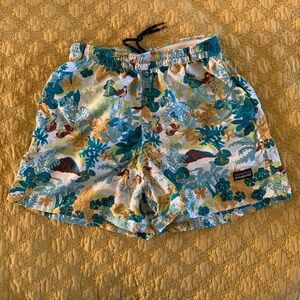Kids Patagonia baggies in tropical pattern.